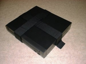 bootmountvelcropcinbefore1.jpg - I used velcro to hold the CPU in the rear of the car. This was a cheap but effective mounting solution. Here you can see it been sized up