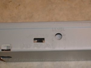 fmmodulatorcloseup.jpg - To get sound in to the OEM head unit I used an FM modulator how ever this does not replicate the sound at CD quality therefore to an audiophile can be noticable. Here you can see the FM setting switch