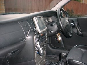 installcompleted2.jpg - Here you can see the screen been fitted with all the cables been routed over the top of the glove box and then in. This gave a neat apprence but still made the bullet connection easy to access to remove the screen at night. Here you can see the fitting completed