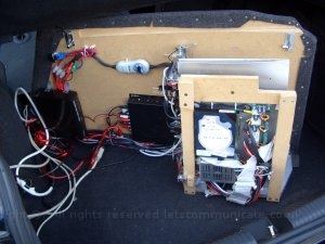 camm5.jpg - Here you can see the rear of the cage with the DTT tuner and scart selector for future use