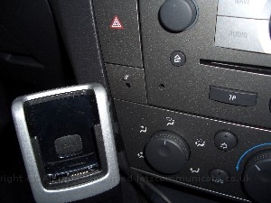 doubledinscreenbuild20.jpg - To install the IR / Light sensor I had to create some space for the cable. There was a plastic holder which was removable for some of the incar wiring. I simpley removed it, then using a dremel created a channel for the cable and then refitted with the cabel already passed through. Once the moddified blanker was replaced it gave an OEM feel although this was not the initial design I was happy with it