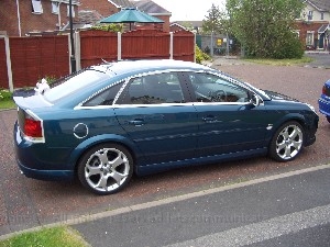 vectracdetailing3.jpg - Before I start give the car a light clean with the jet spray as this removes hard muck and prevents friction when cleaning on the next phase. Clean the car well ( I use Autoglym Conditioning shampoo ) ensuring that I clean panel by panel and rinse down before moving on. After its dry cover up all back areas with masking tape ( 3m stuff is better but I could not get hold of any at the time ). I then place the wipers in bags again to protect from the polishing marks.